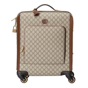 Beige and brown suitcase with patterned design on a white background