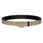 Designer belt with GG logo on a light gray background