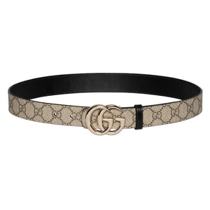 Designer belt with GG logo on a light gray background
