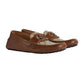 Pair of brown leather loafers with a textured pattern on a light gray background