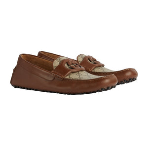 Pair of brown leather loafers with a textured pattern on a light gray background