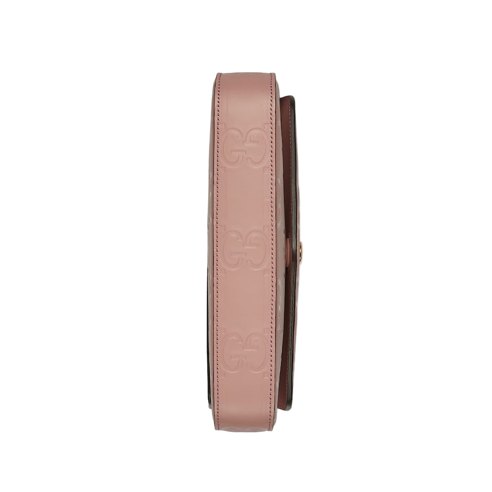 Pink belt with a brand logo on a light gray background