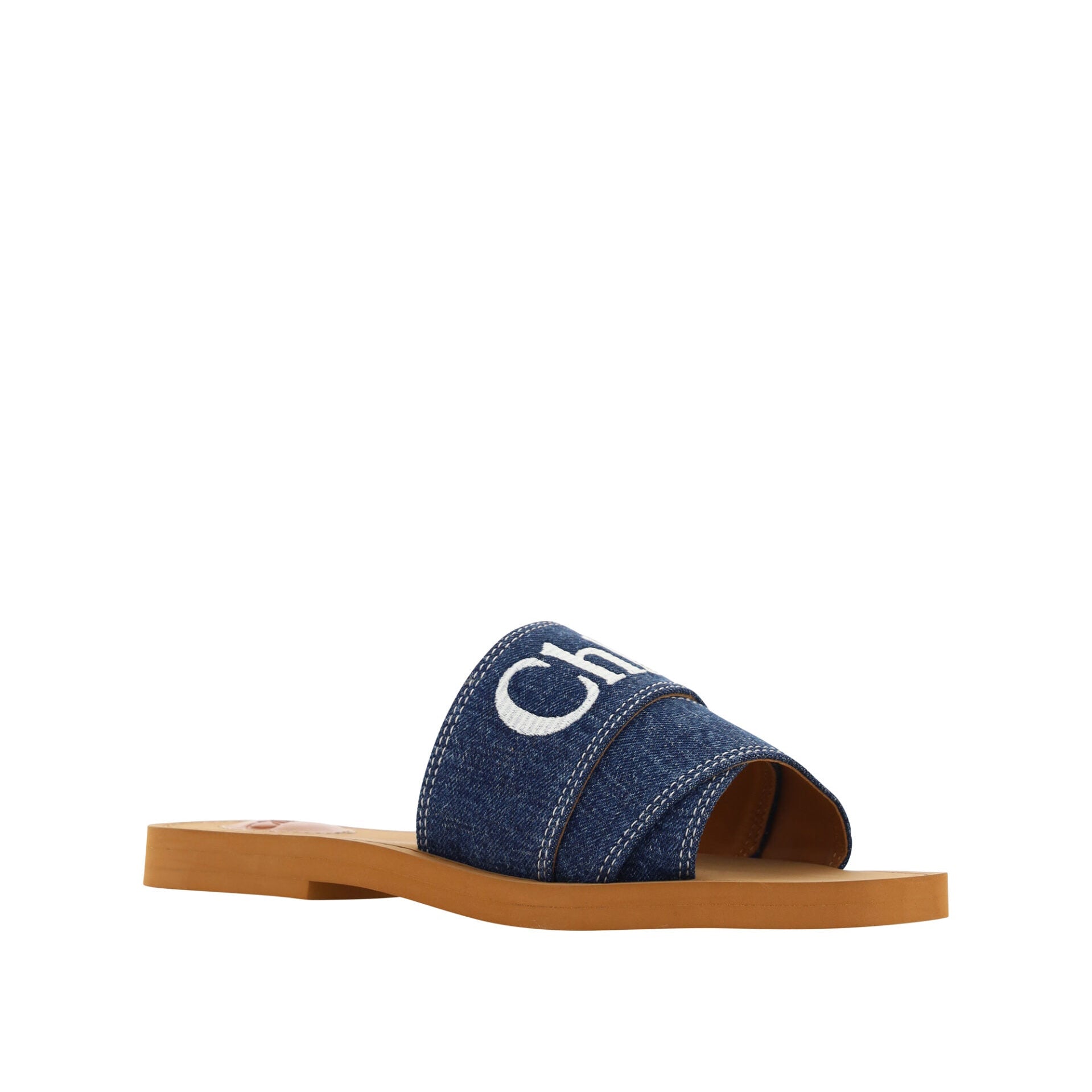 Blue sandal with a brown sole on a white background