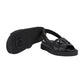 Black sandal with a logo on a light gray background