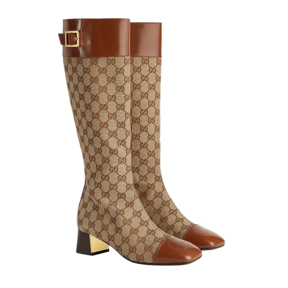 Beige and brown patterned knee-high boots with a gold buckle on a light gray background