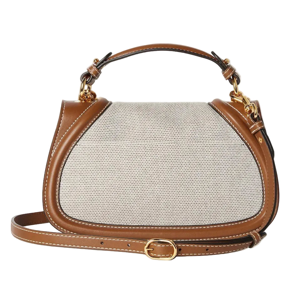 Handbag with brown leather and mesh design on a light gray background