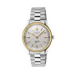 Gucci watch with silver and gold band on a light gray background