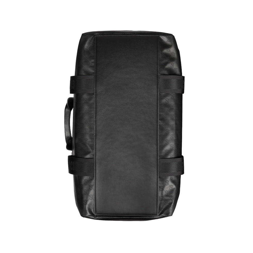 Black leather duffel bag on a light gray background