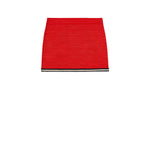 Red woven Gucci mini skirt on a white background