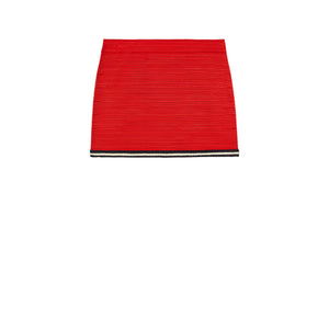 Red woven Gucci mini skirt on a white background