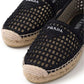 Black Prada espadrilles with jute sole on a white background