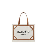 Balmain Paris tote bag with brown handle and trim on a white background
