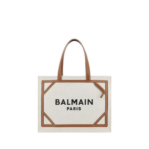 Balmain Paris tote bag with brown handle and trim on a white background