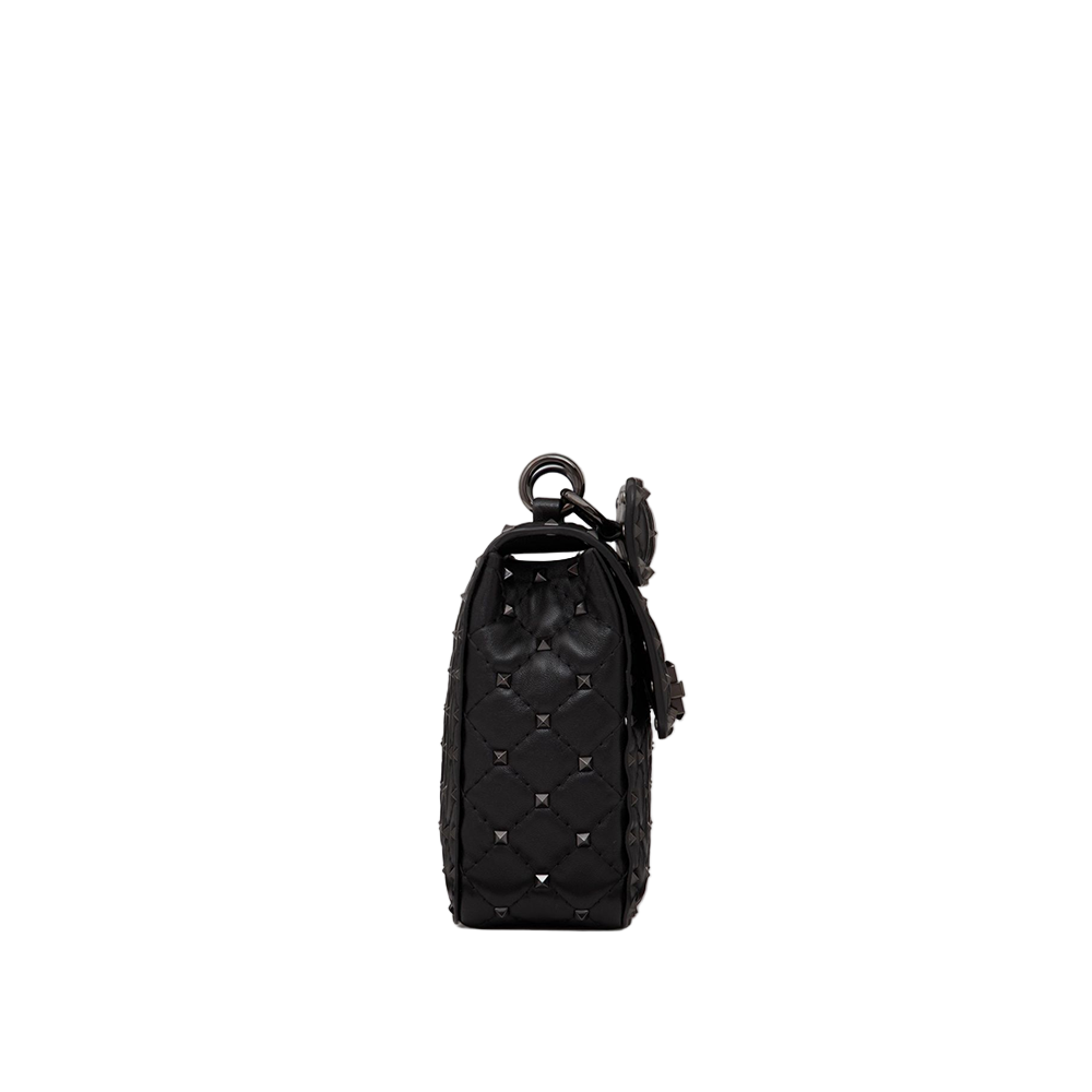 Black pouch with decorative elements on a white background