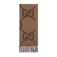Brown scarf with black pattern on a light gray background