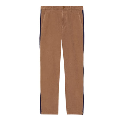 Brown Gucci pants with black side stripes on a light gray background