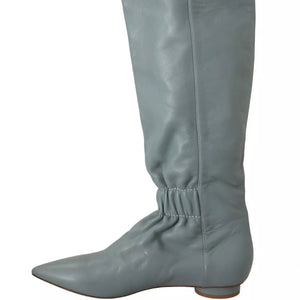 Gray knee-high boot on a white background