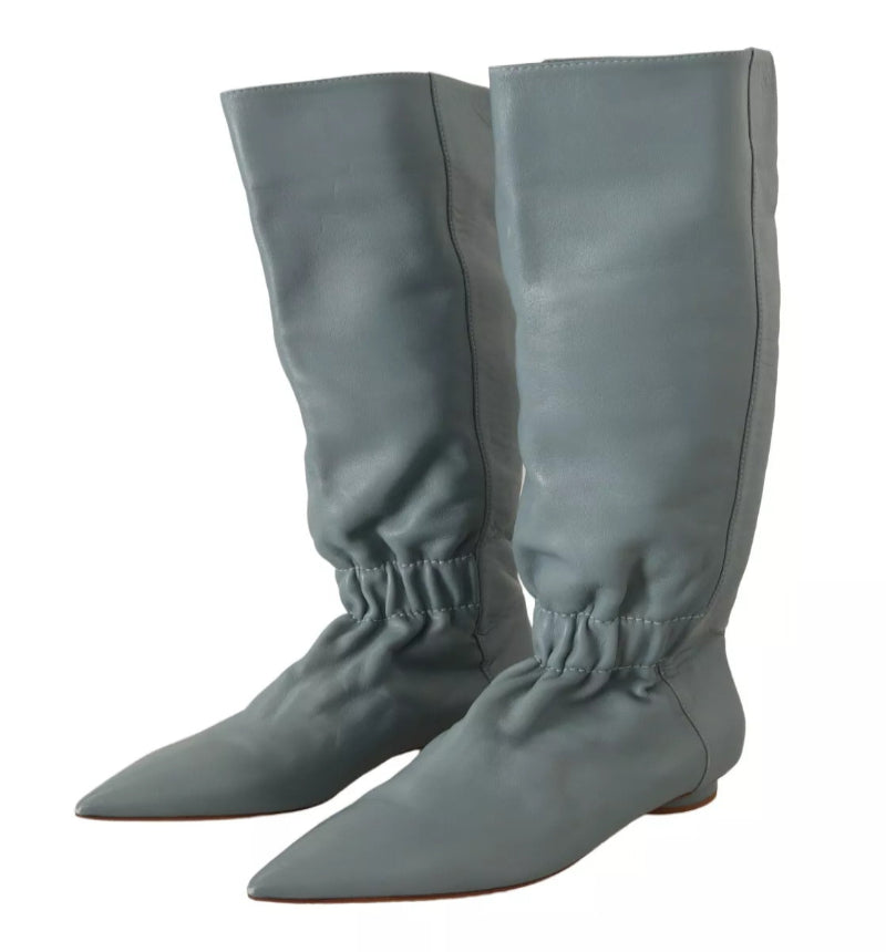 Pair of gray knee-high boots on a white background