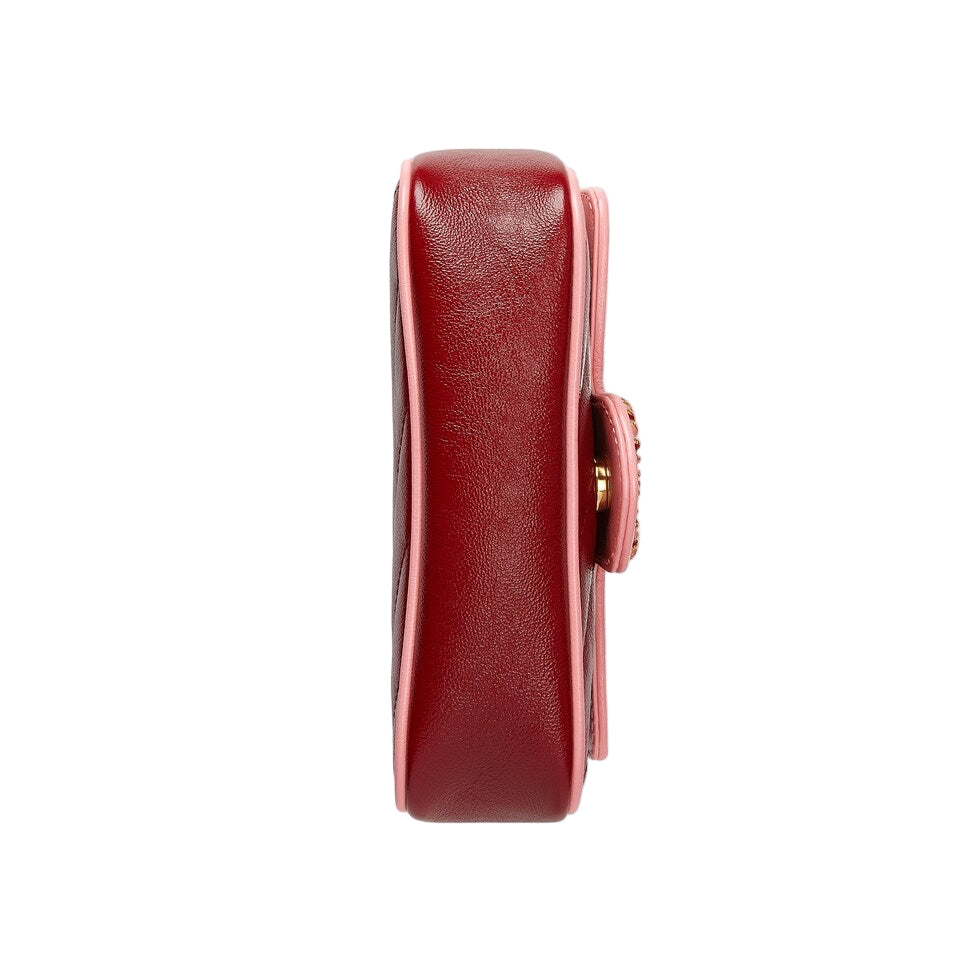 Red leather wallet on a light gray background