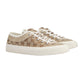 Beige sneakers with a pattern on a white background