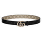 Designer belt with GG logo on a light gray background