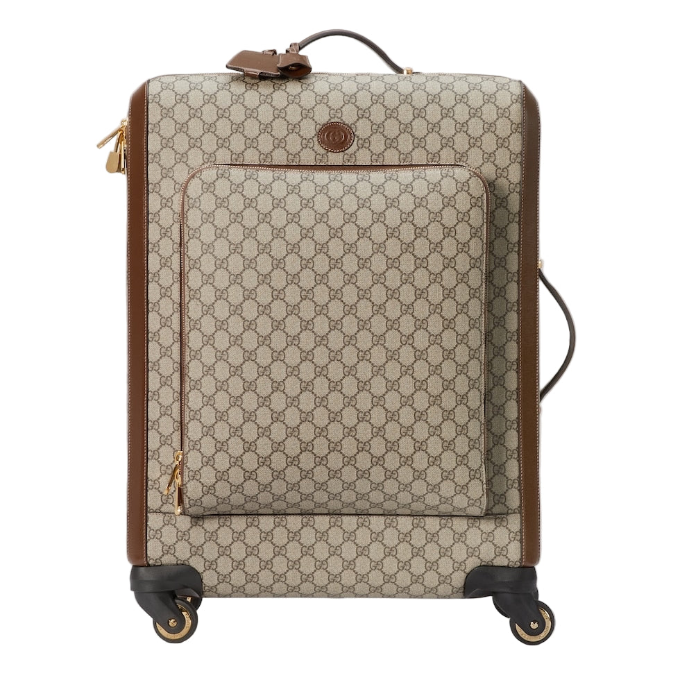 Beige patterned suitcase with brown accents on a light gray background