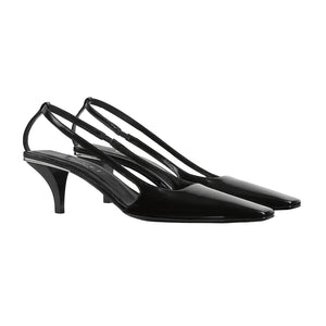 Black high-heeled shoes with slingback design on a white background