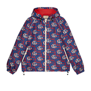 Blue Gucci jacket with red and white pattern on a light gray background