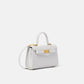 White handbag with gold accents on a white background