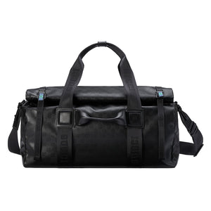 Black duffel bag with visible branding on a light gray background