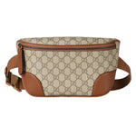 Beige and brown patterned waist bag on a light gray background