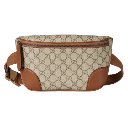 Beige and brown patterned waist bag on a light gray background