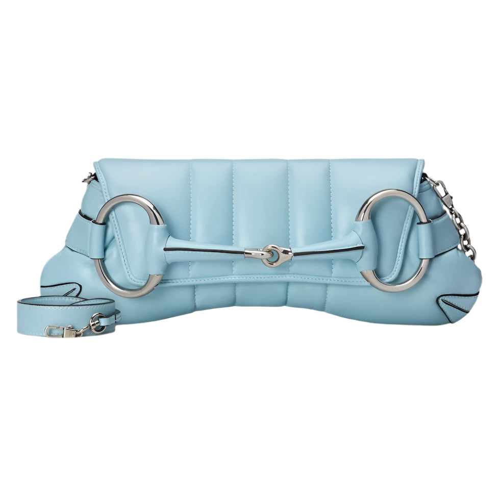 Light blue Gucci Horsebit quilted handbag with silver hardware on a light gray background