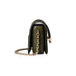 Green handbag with a gold chain on a light gray background