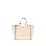 Beige handbag with 'Chloe' branding on a white background