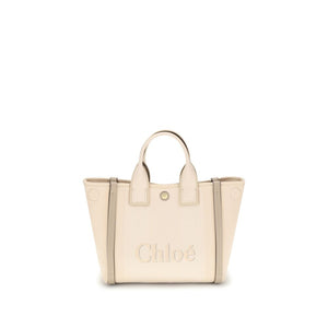Beige handbag with 'Chloe' branding on a white background