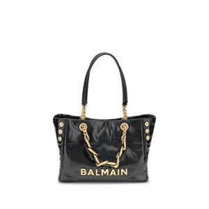 Black handbag with gold chain and 'Balmain' branding on a white background