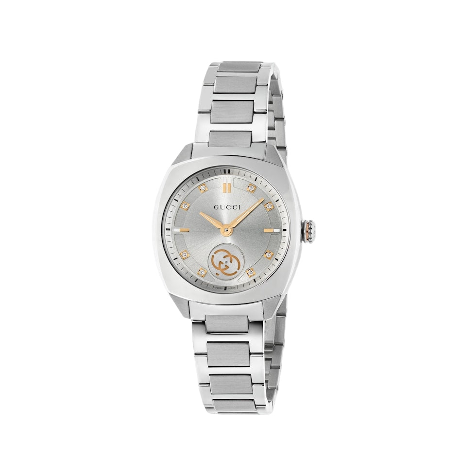Silver Gucci watch on a light gray background