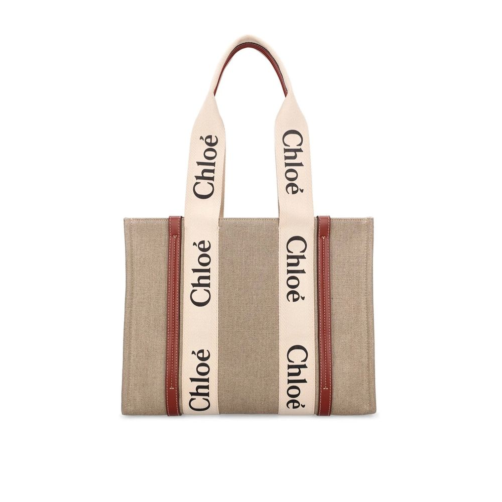 Chloe tote bag with branded strap on a white background
