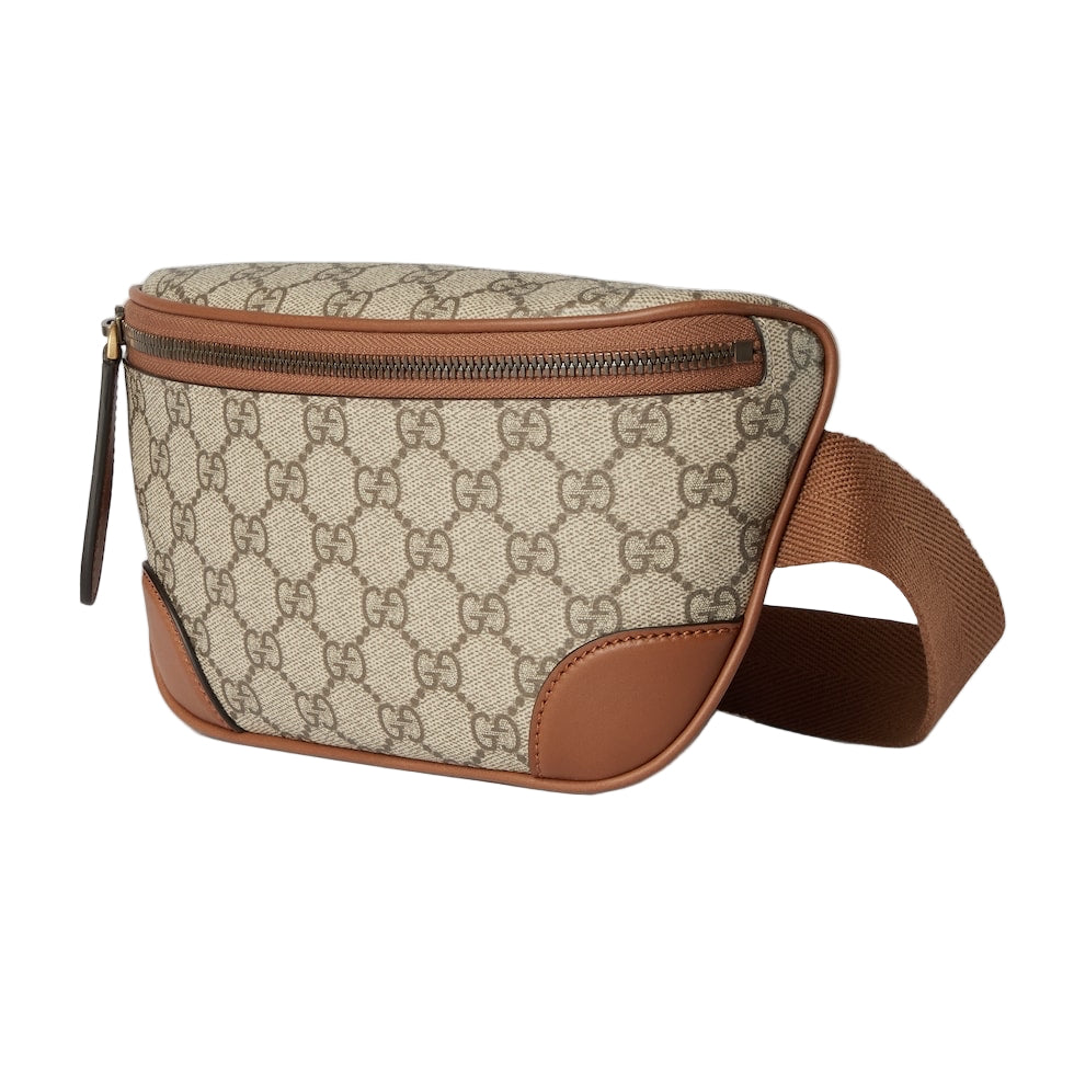Beige and brown patterned waist bag on a light gray background