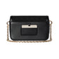 Black handbag with gold chain strap on a light gray background
