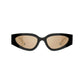 Black cat-eye sunglasses with gold lenses on a white background