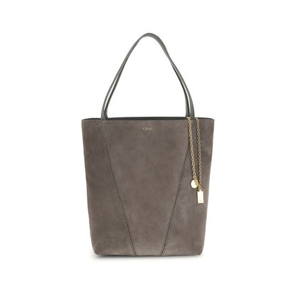 Gray tote bag with a gold chain detail on a white background