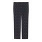 Black pants with a subtle pattern on a light gray background