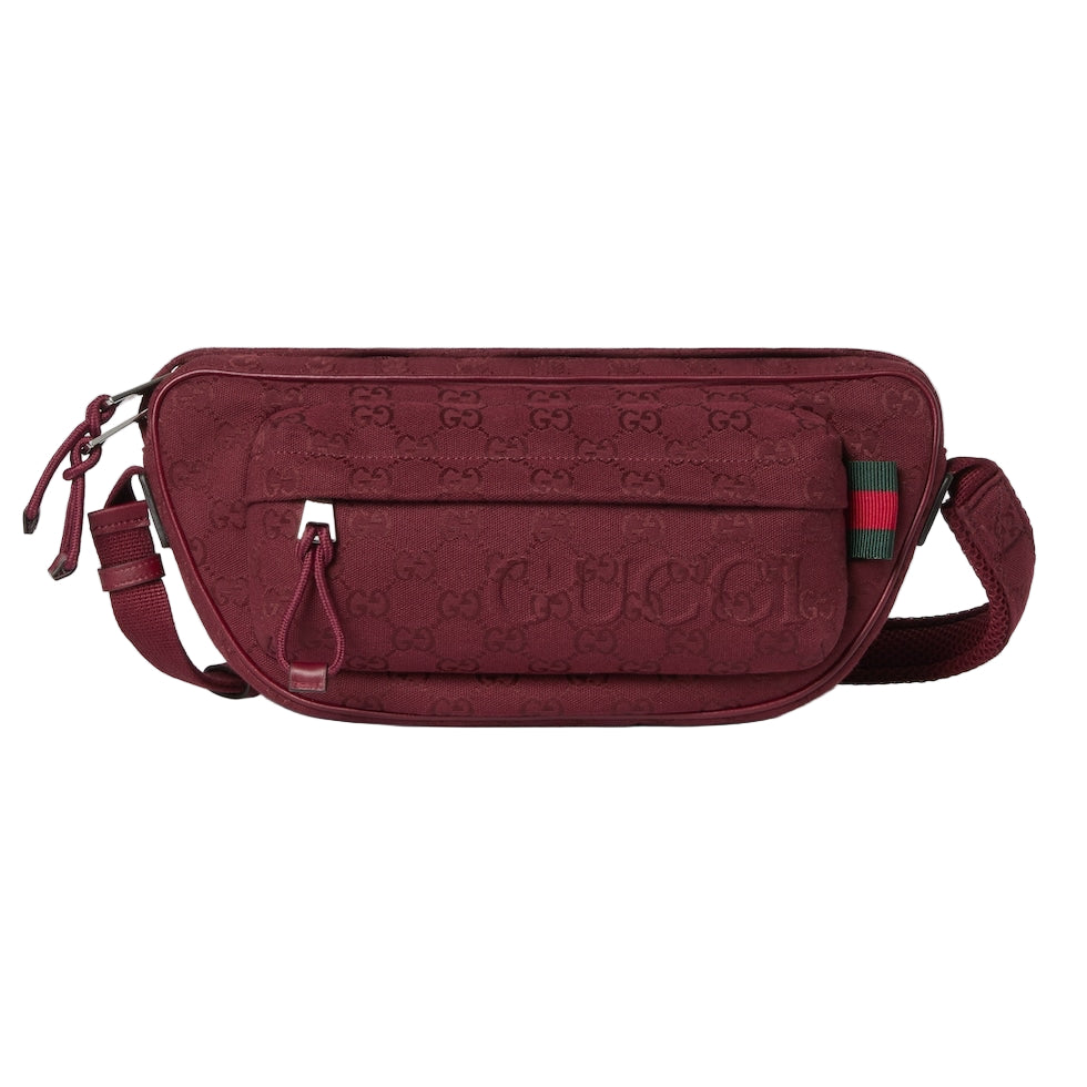 Maroon Gucci bag with logo on a light gray background