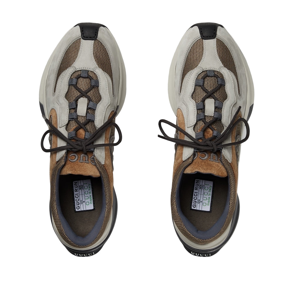 Pair of Gucci sneakers on a white background