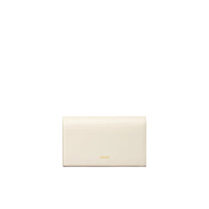 Beige clutch bag on a light beige background