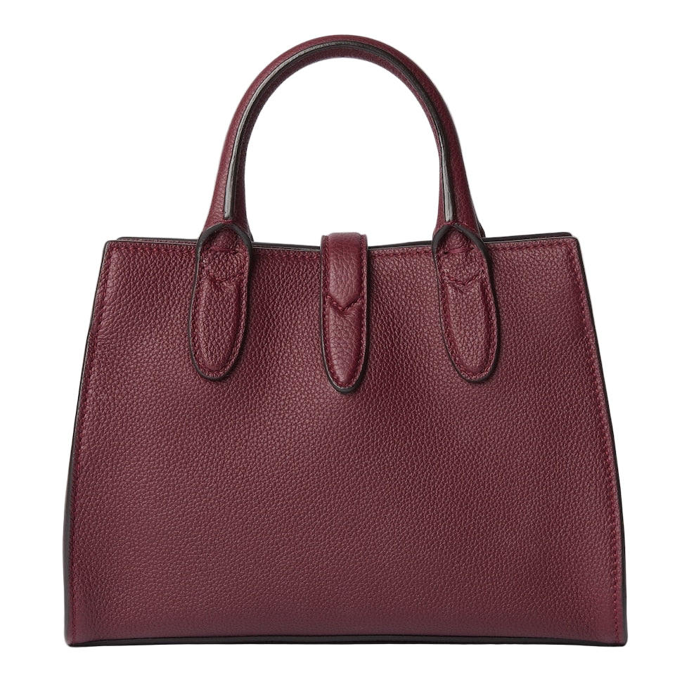 Maroon handbag on a light gray background