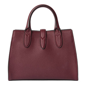Maroon handbag on a light gray background