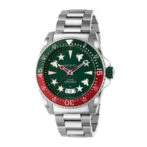 Gucci watch with green and red face on a light gray background